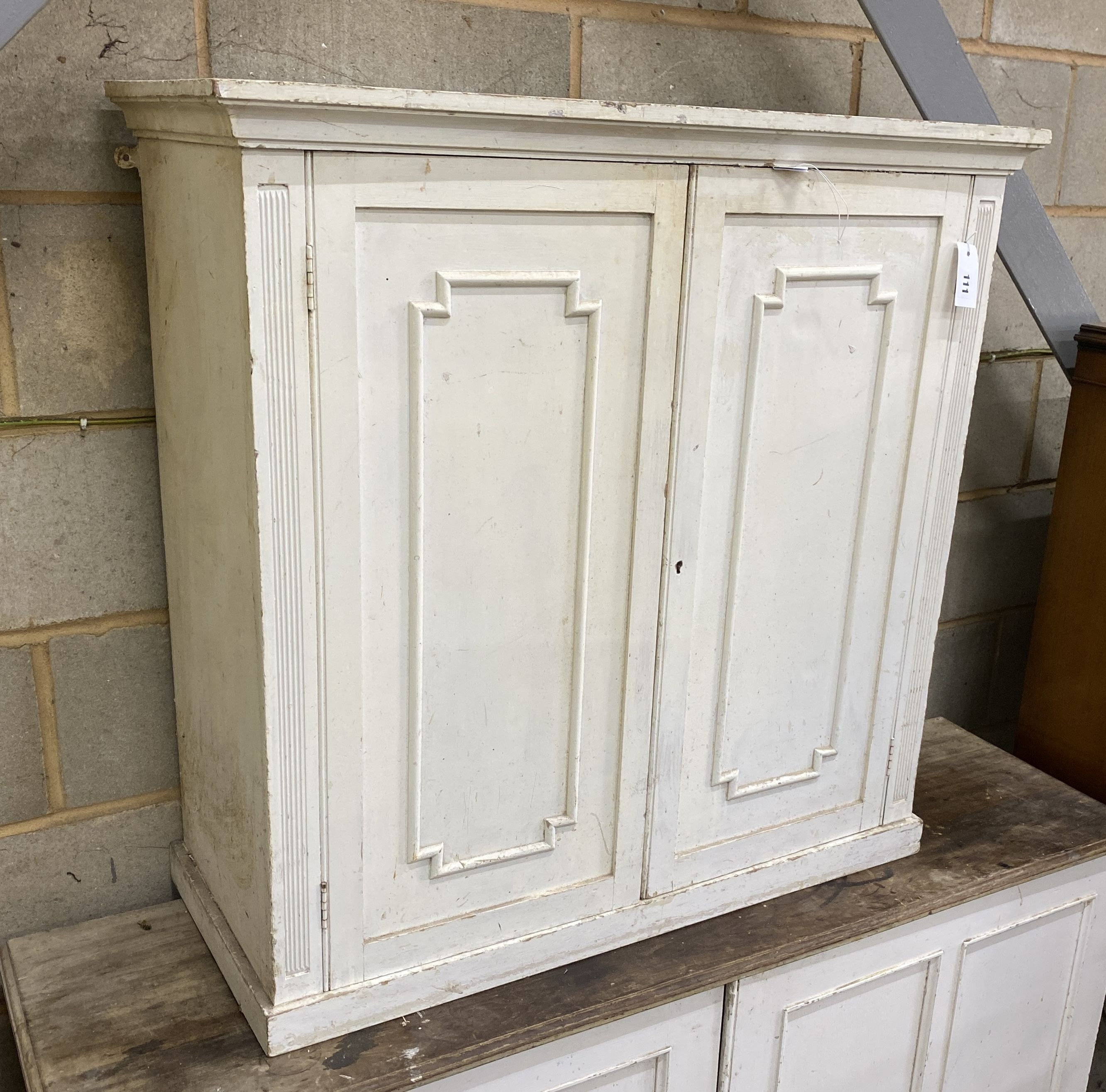 An early 20th century painted two door side cabinet, width 92cm, depth 39cm, height 91cm